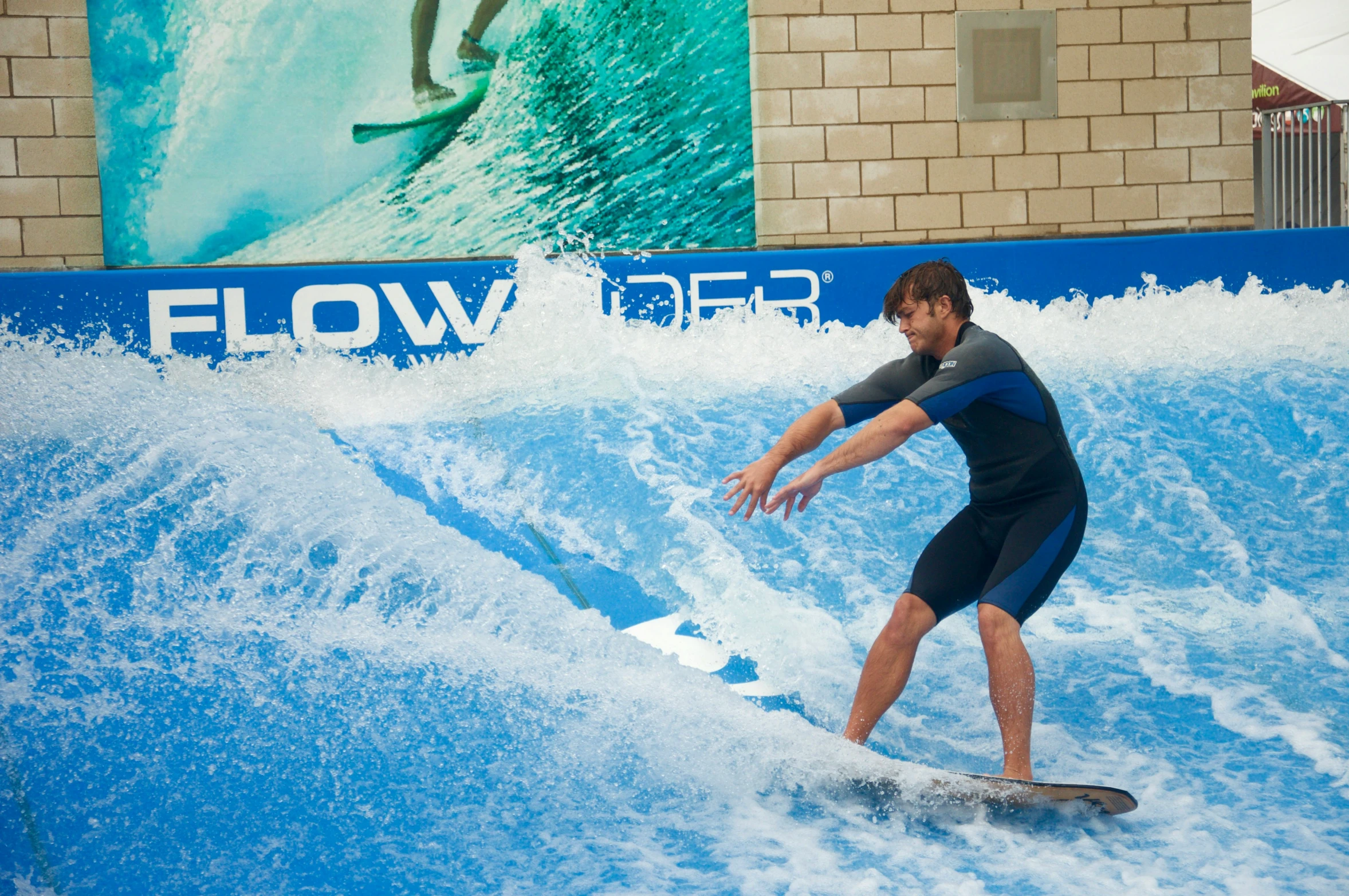 there is a male surfer riding a wave in the water