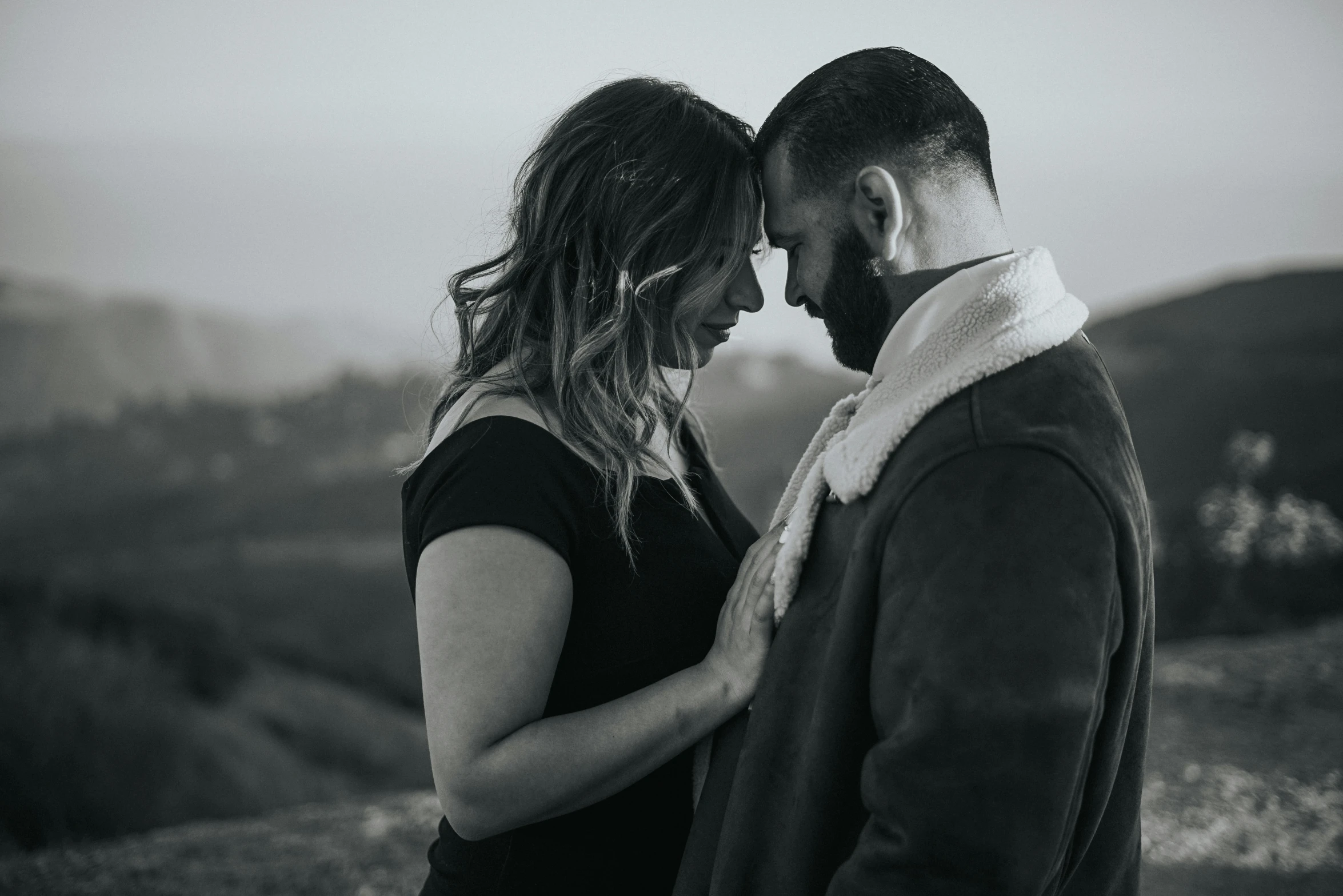 a man and a woman looking at each other