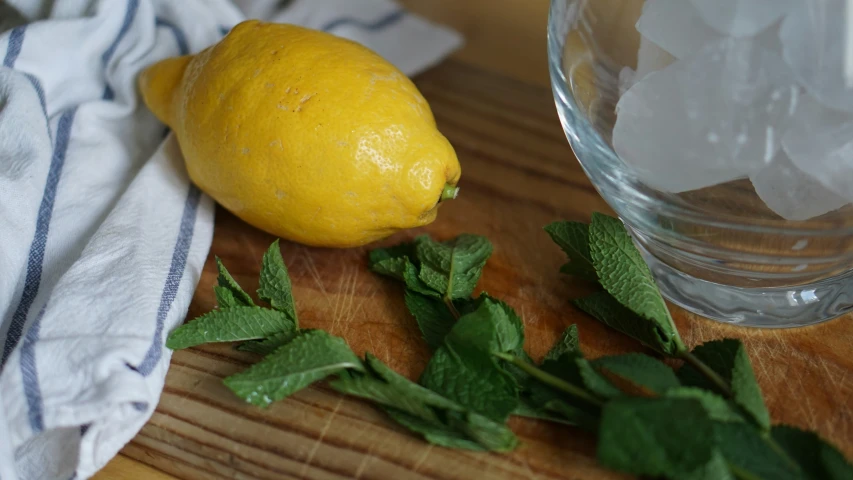 some food and some water on a wooden table