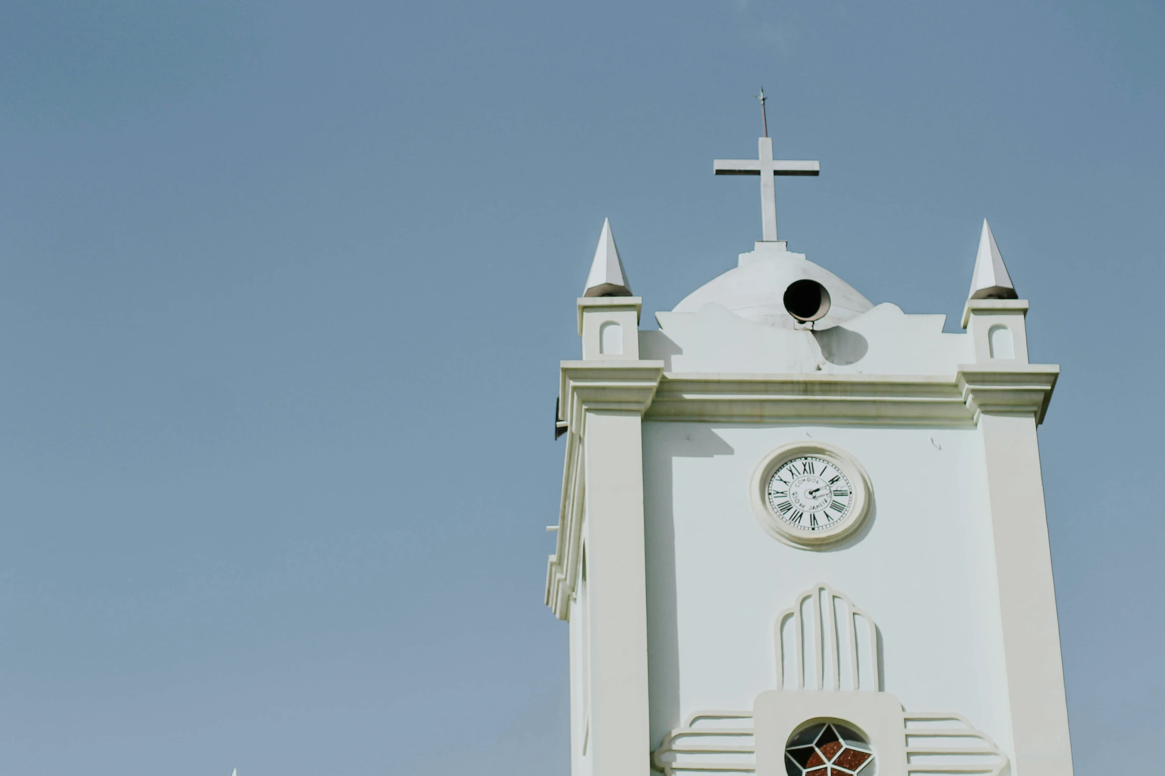 an image of a steeple with a cross at the top