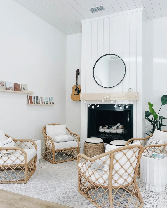 living room with wicker furniture and mirror