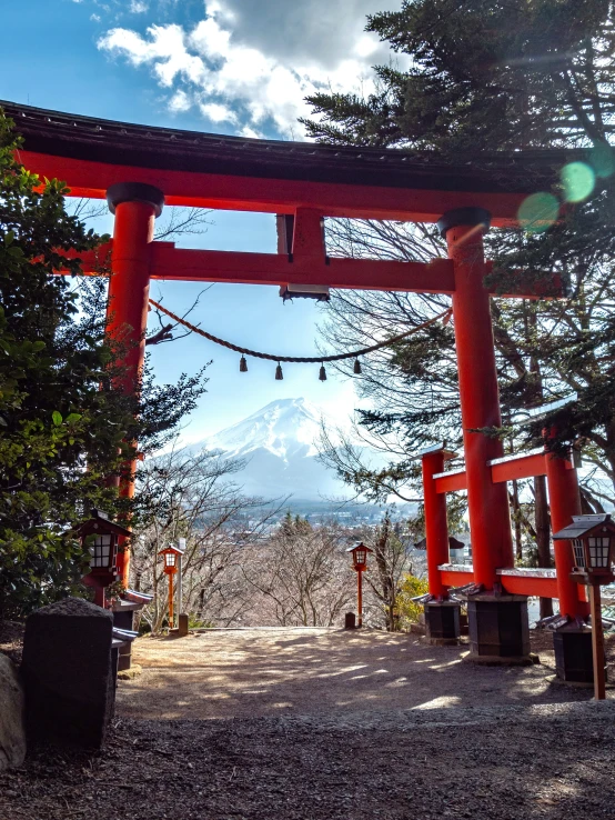 the mountain in the distance is covered by a shinji roof