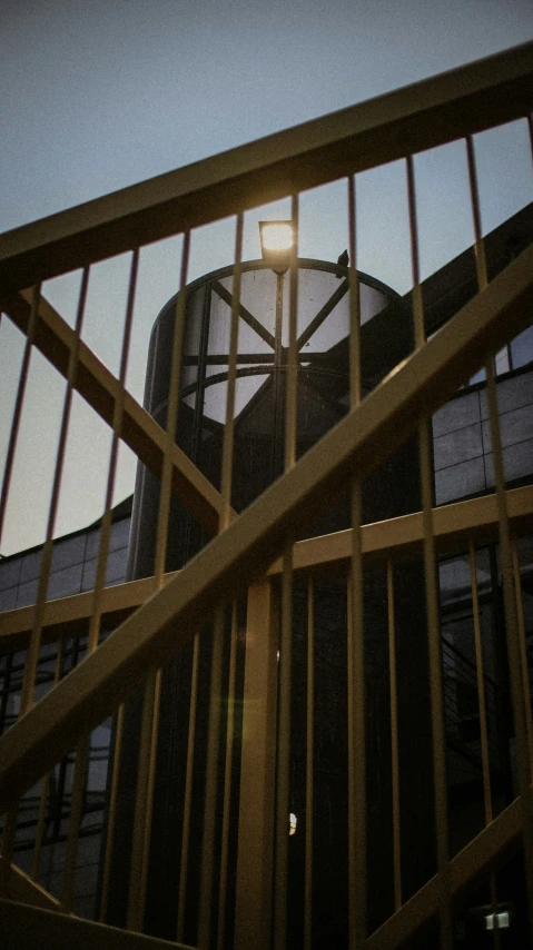 a steel structure sitting next to an industrial building