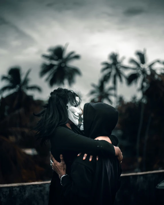 a couple is dressed up for halloween on the boardwalk