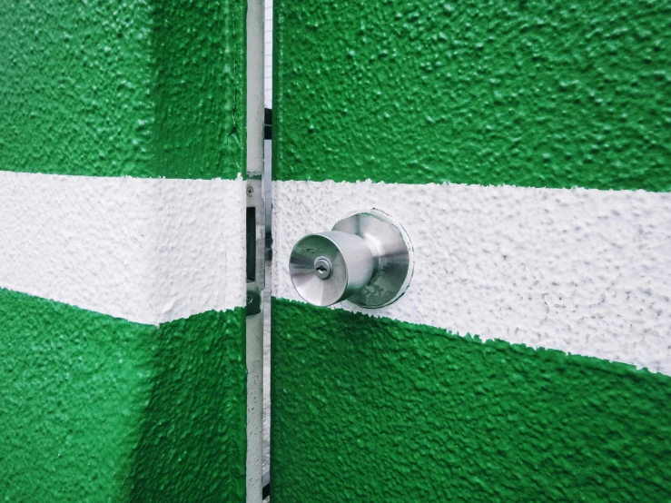a picture of a green and white painted wall