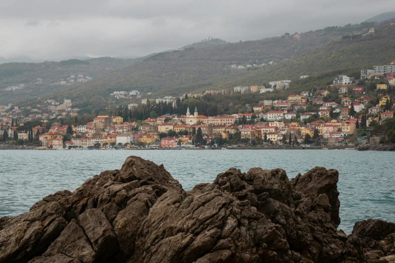 the sea waves near some very pretty city