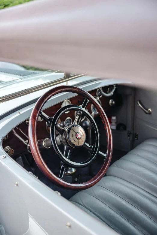 the dashboard and steering wheel of a sports car