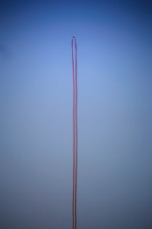 a jet airplane is seen passing through the air