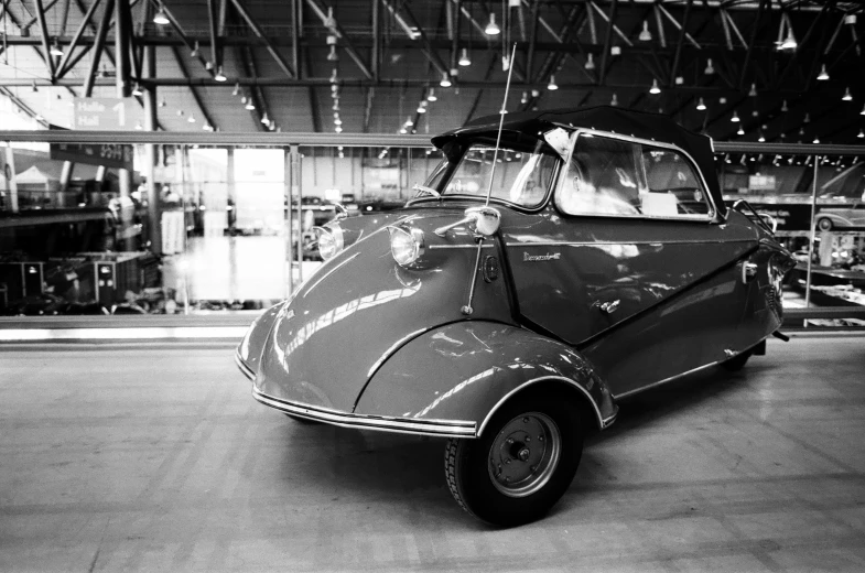 a black and white po of an old car