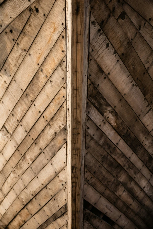 the wooden structures in the wall are peeling