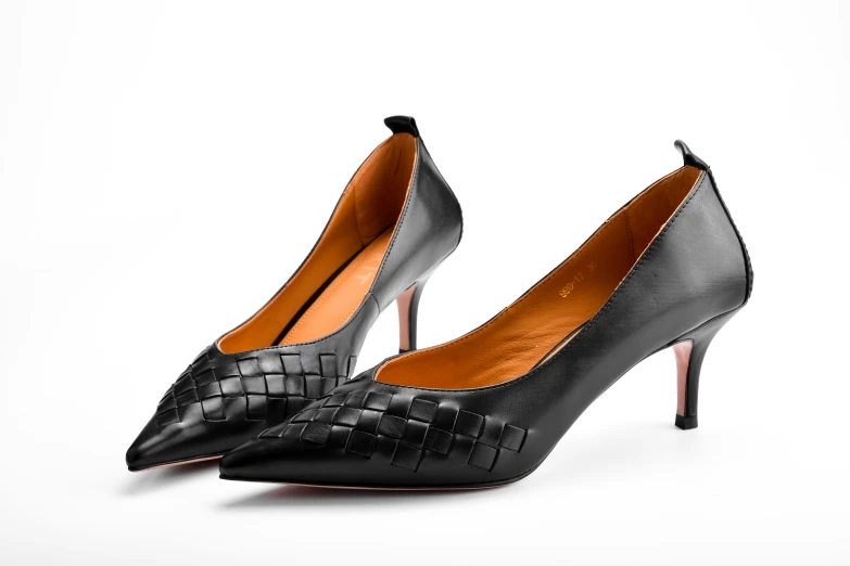 a pair of black high heel shoes with matching insulators