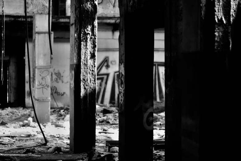 an abandoned warehouse is shown in black and white