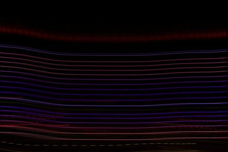 the image shows lines of different colors at night