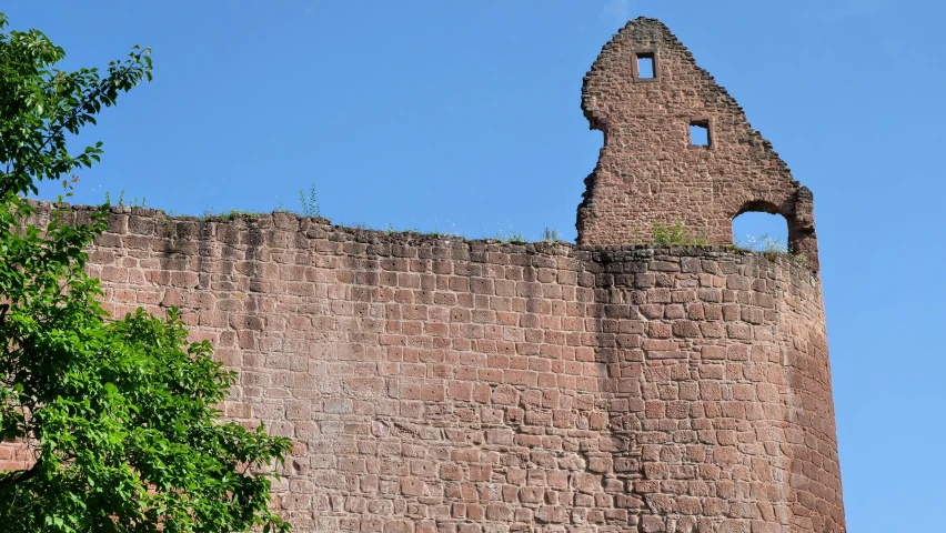 the wall has a large brick design on it