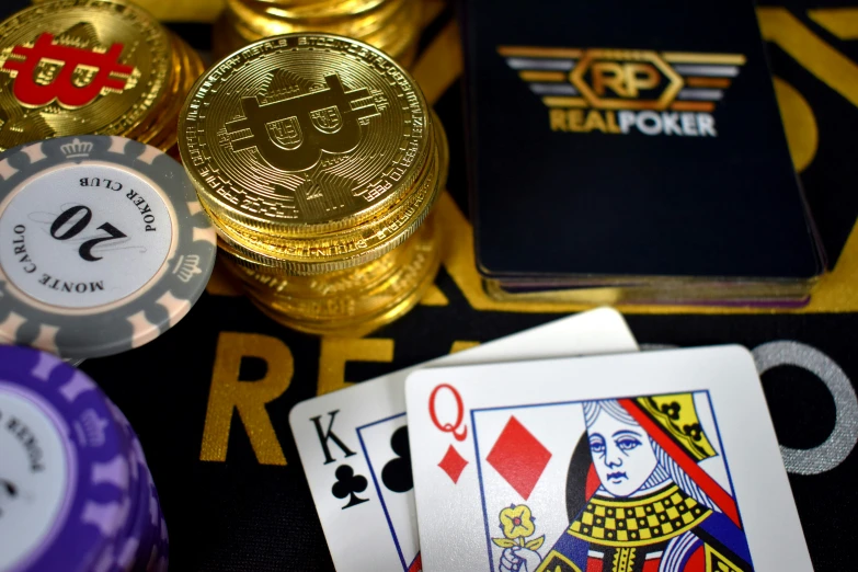 various casino chips and cards sitting on top of a table