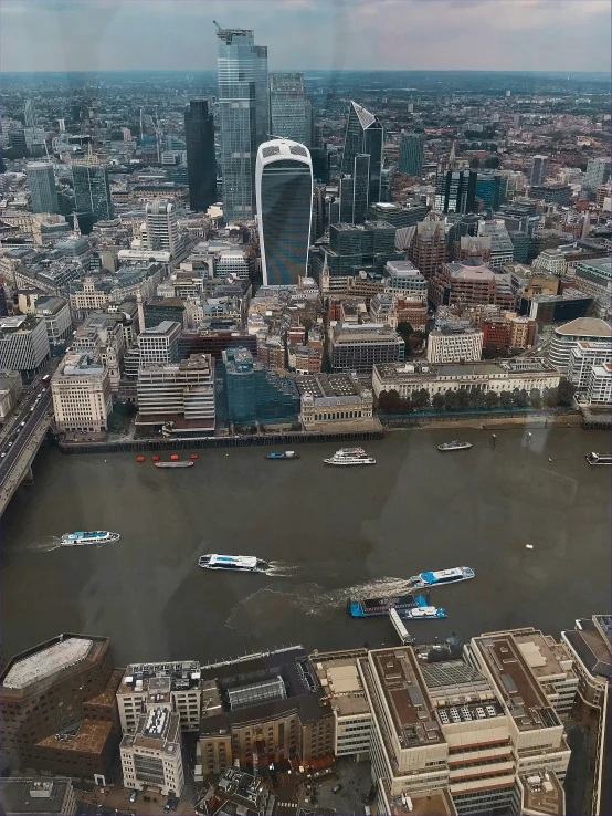 an aerial view shows an expanse of water and buildings