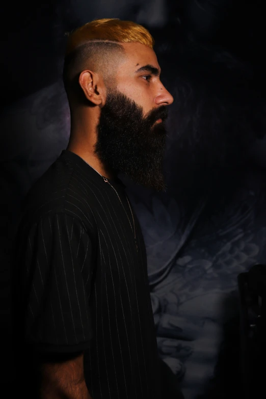 a man with a bald face and long beard