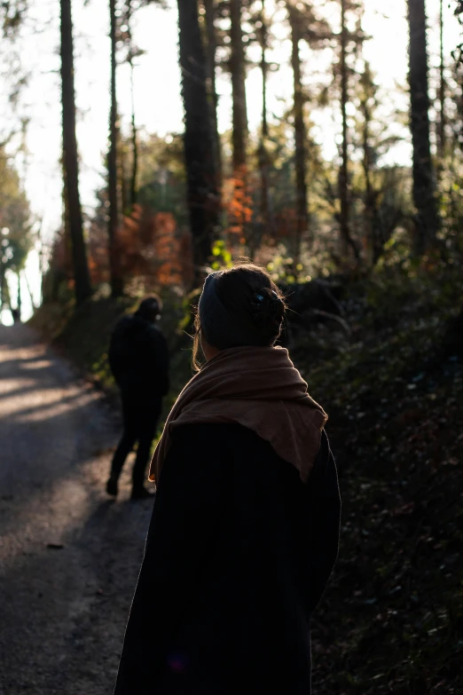 a person walking alone down the road