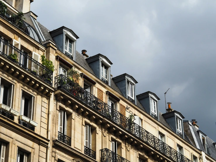 many buildings with various balcony decorations on them