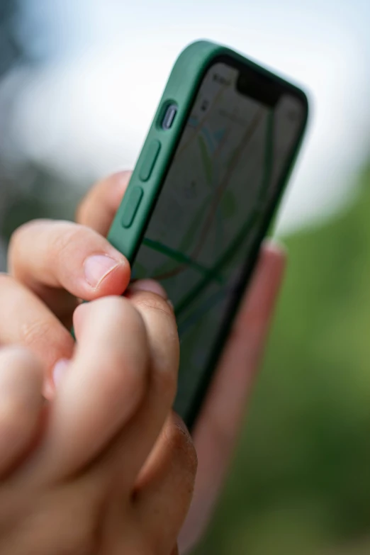 a person is holding a cellphone up