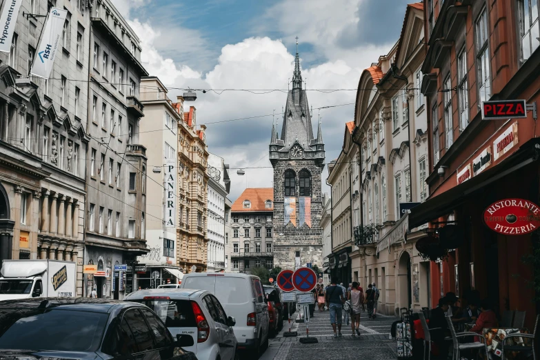 a view from the sidewalk of a city street