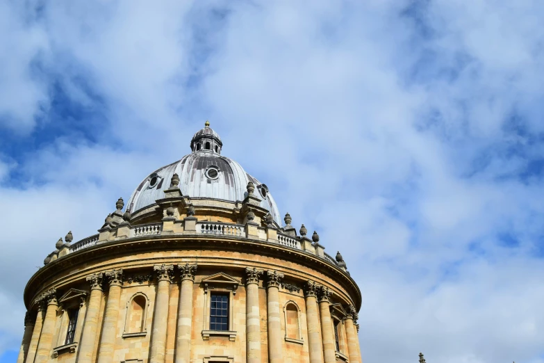 the dome of a large building on a cloudy day