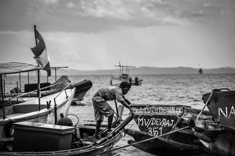 an image of a man on a boat with a flag