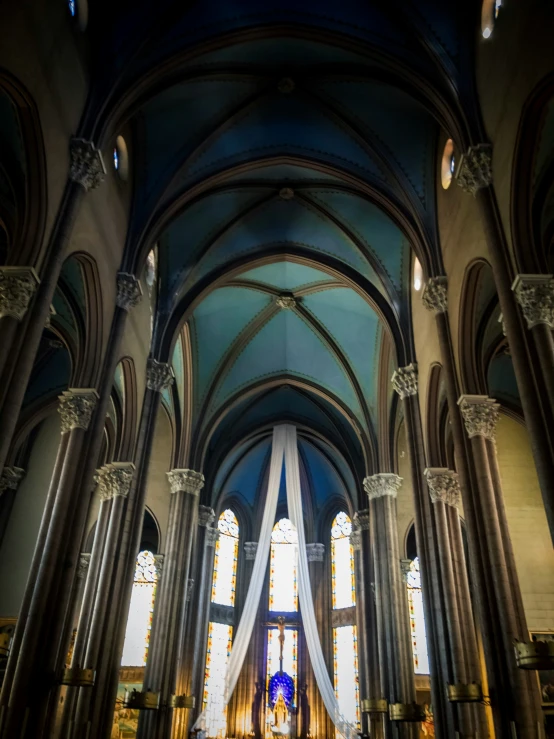 a cathedral with high ceilings and high altar