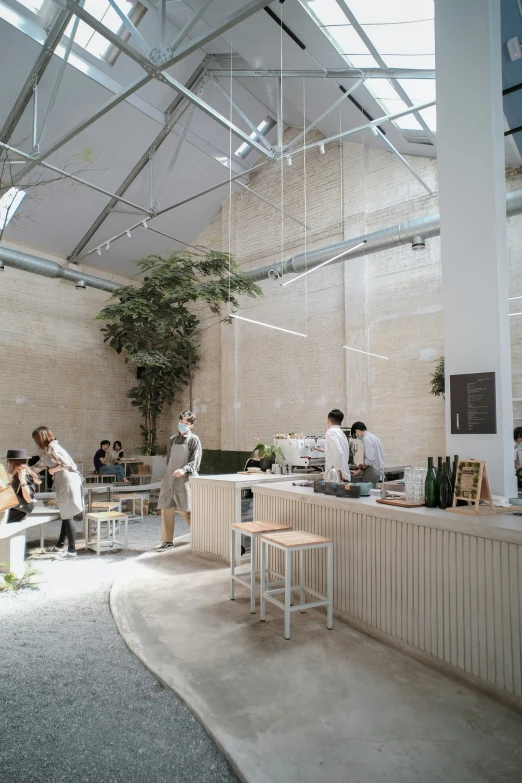 several people gather in an office building for lunch