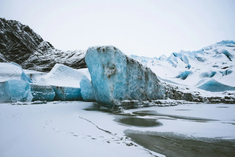 the ice has frozen and chunks of ice are falling