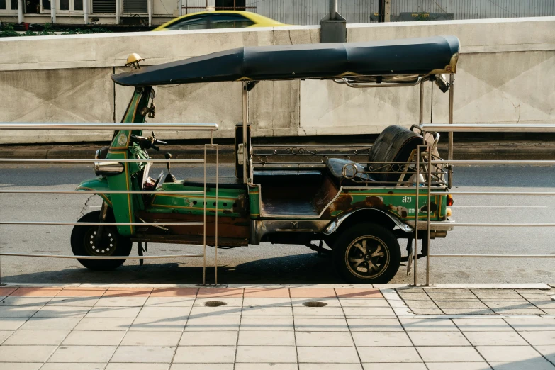 an old golf cart is on display for people to see