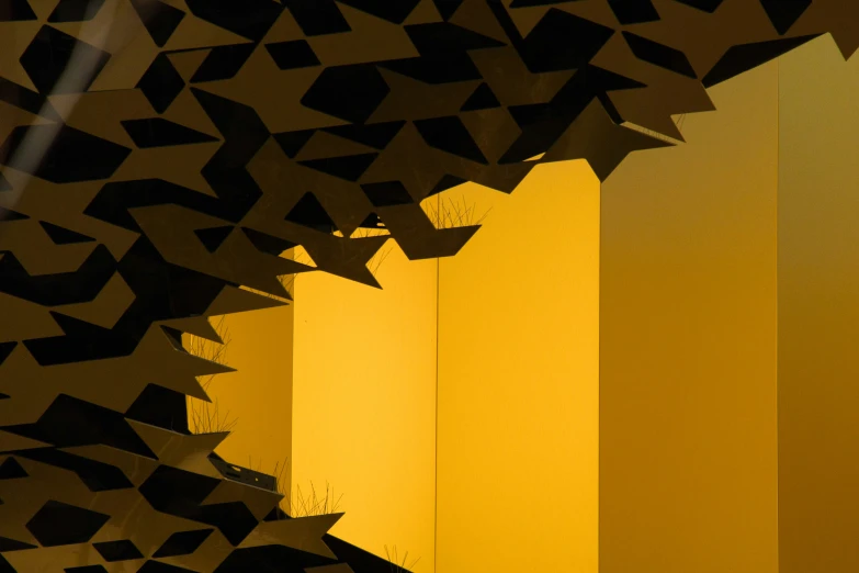 a dark and yellow room has an irregular design