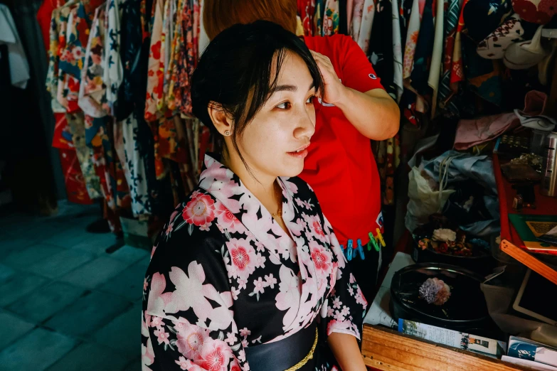 an image of a woman in front of a closet