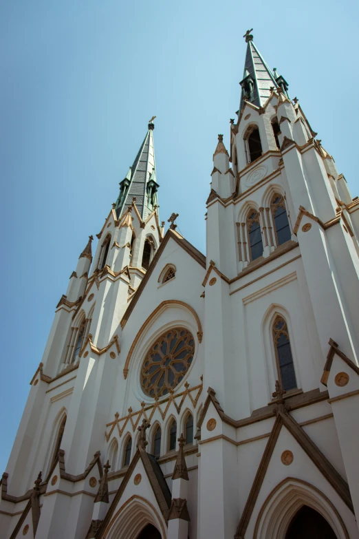 view up at two large towers on a cathedral