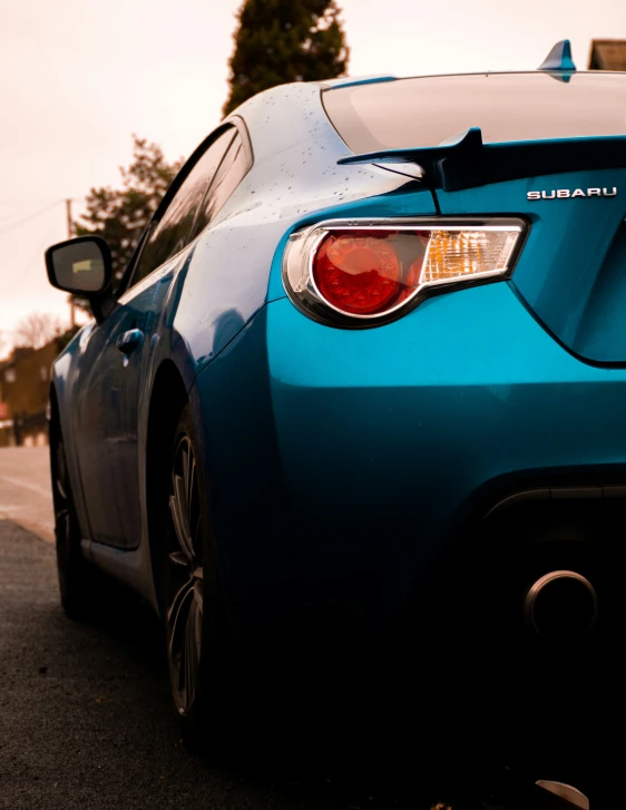 a car sits parked in the street