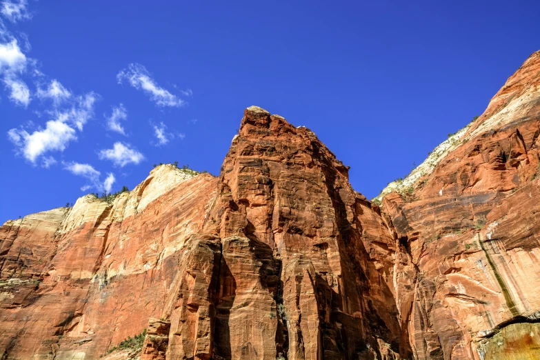 a group of mountains against a blue sky