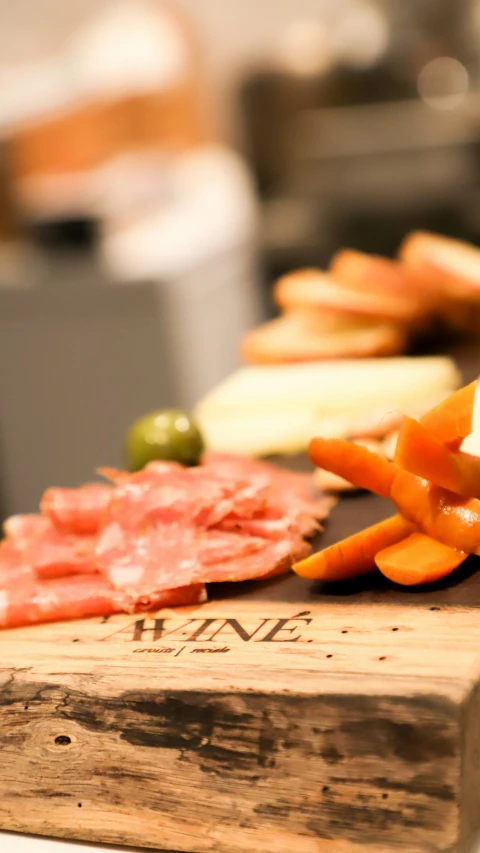 a group of sliced food items arranged on a  board