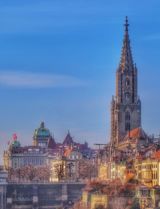 the cathedral with large towers rises above the city