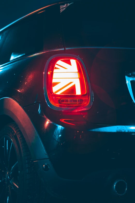 rear view of a black car in the dark