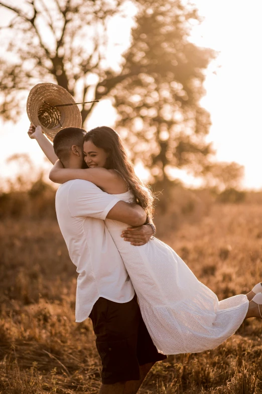 an image of a couple in a field