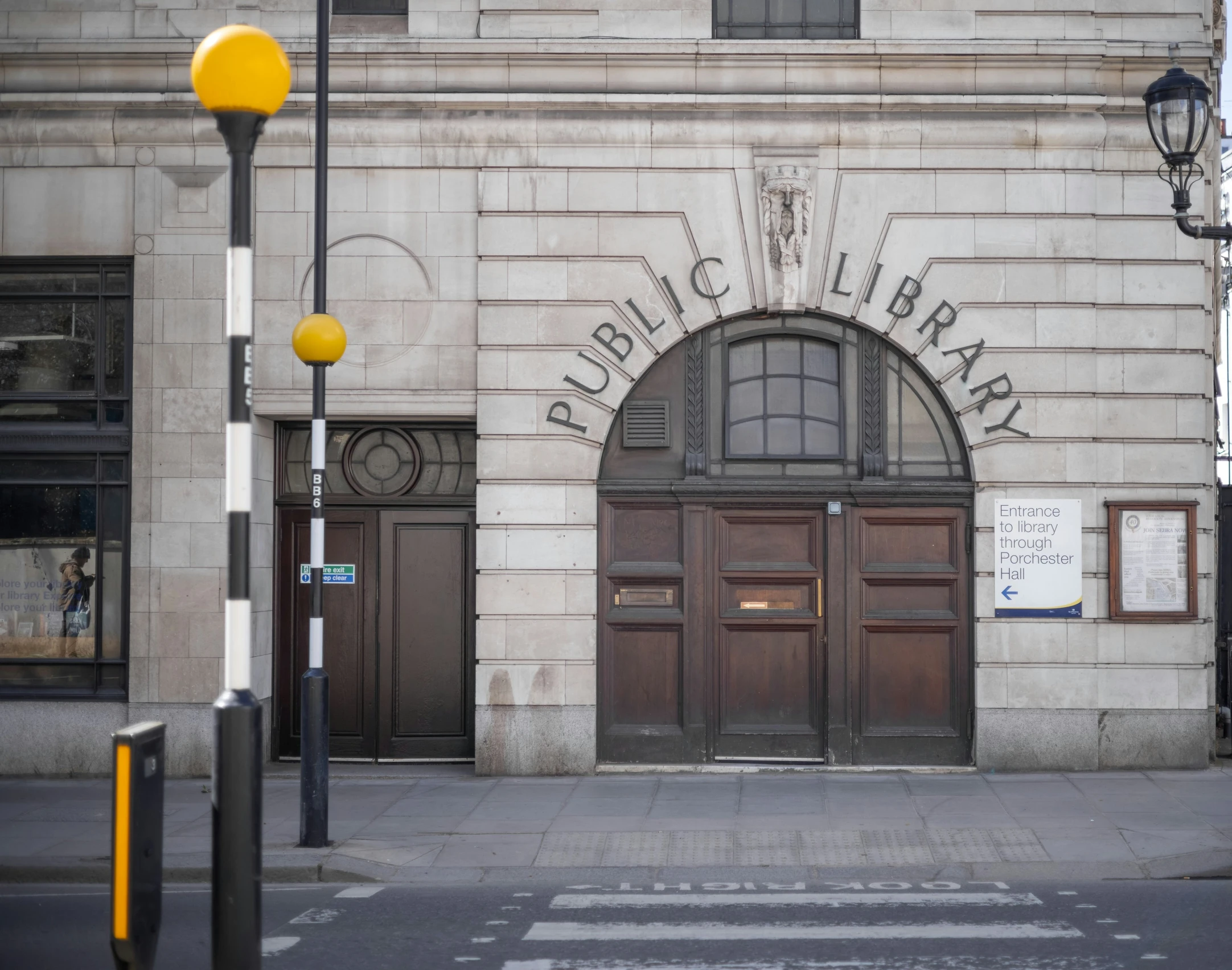 a street with a building that has an entrance