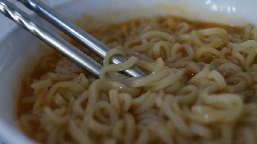 the noodles are made in two kinds of white and black