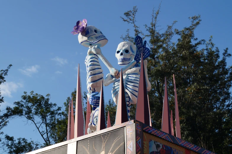 an image of a parade with skeleton decorations