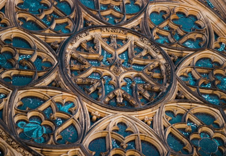 a close up view of windows in an old cathedral