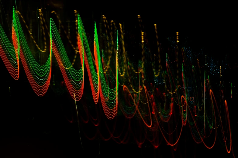 multiple lights on a wall in the dark