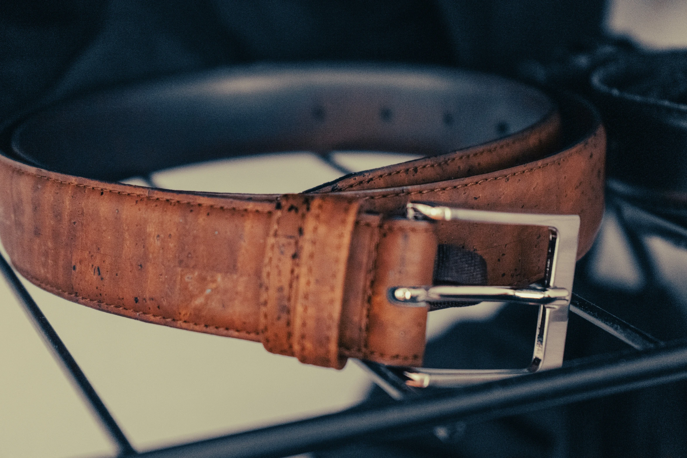 a belt is sitting on top of the stove