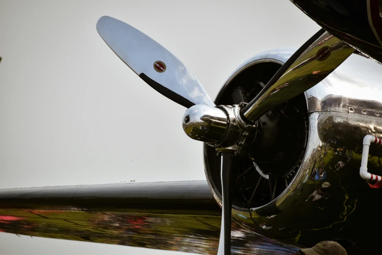 a very big propeller plane is close up