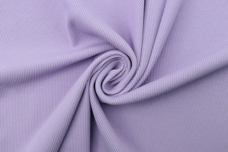 a close up view of the fabric on a lila purple sweater