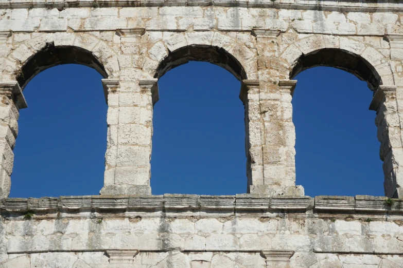 three windows that have been placed to give some view of the sky