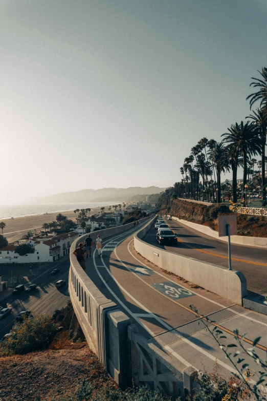 the ocean is next to a highway in california